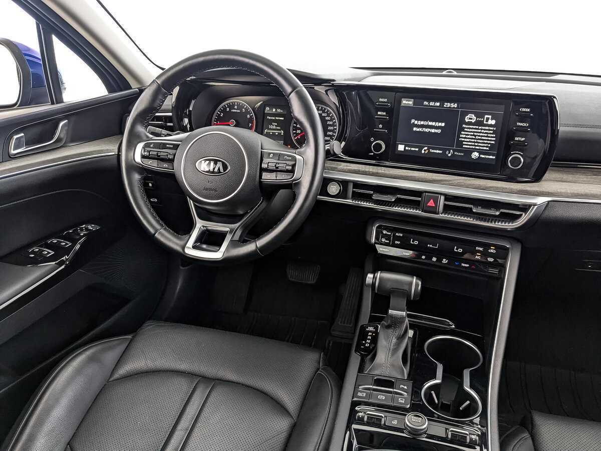 Купить Kia K5 с пробегом. Фото: #16