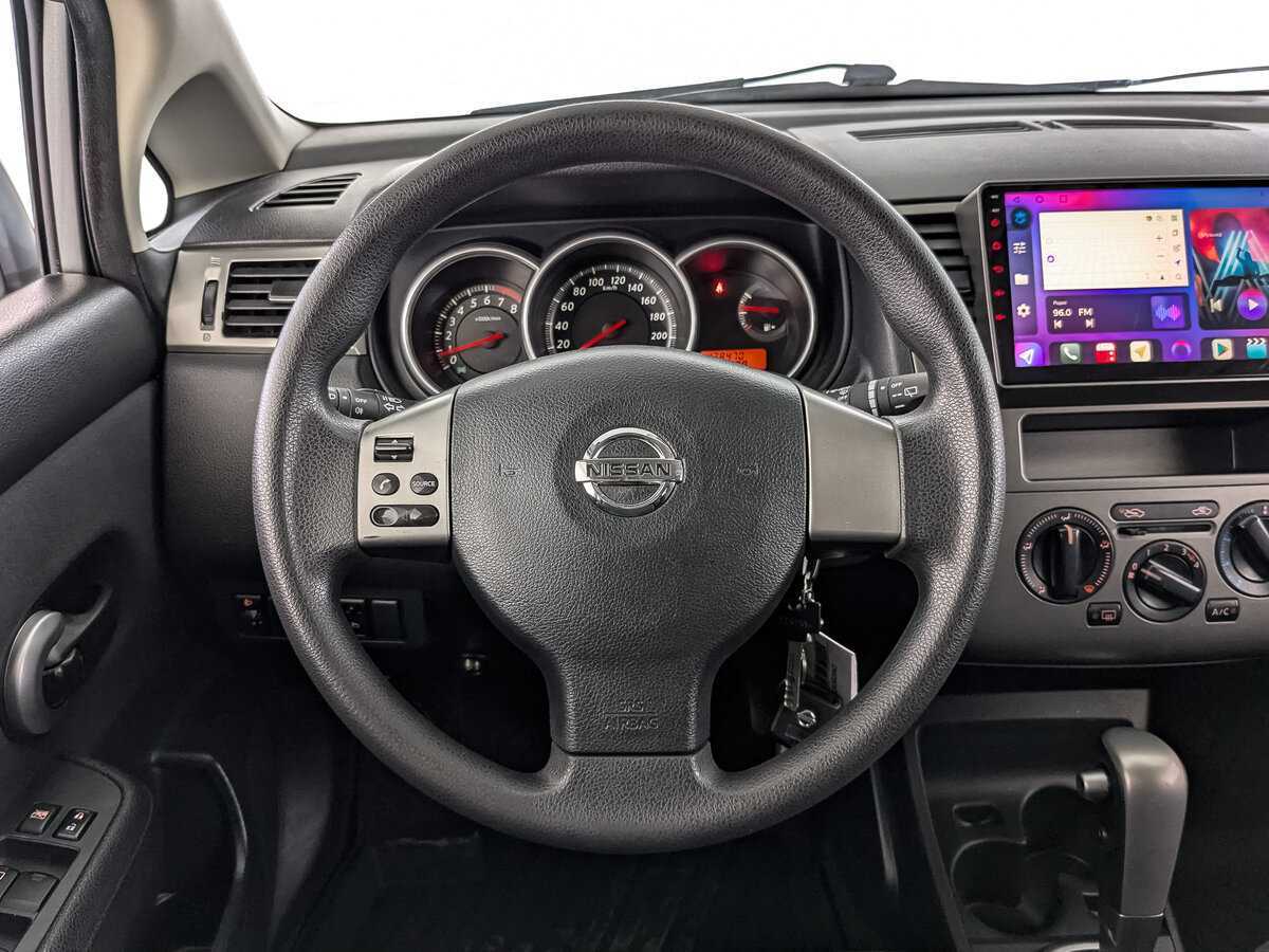 Купить Nissan Tiida с пробегом. Фото: #21