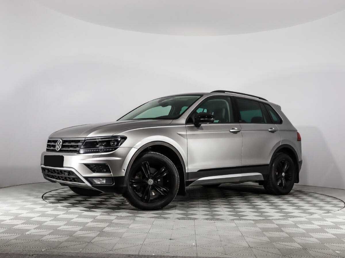Купить Volkswagen Tiguan с пробегом. Посмотреть фото