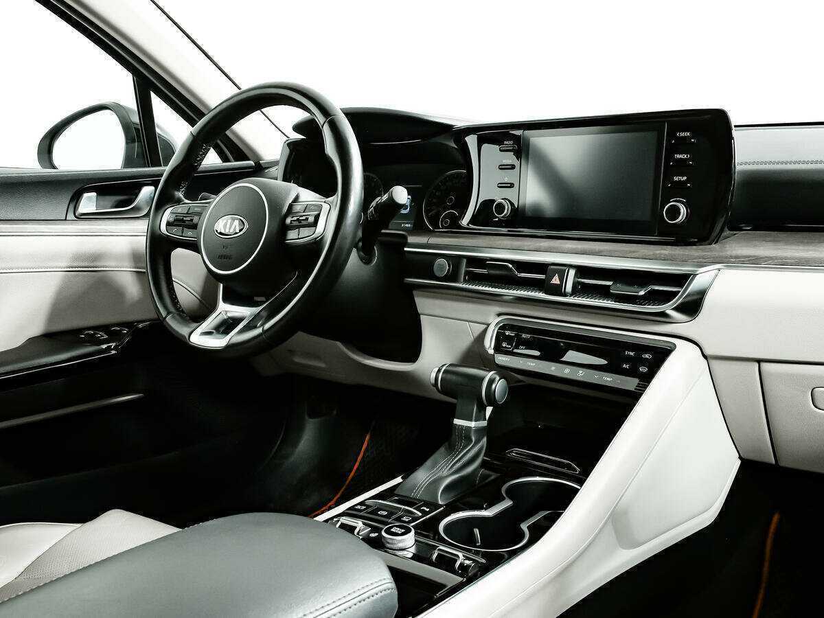 Купить Kia K5 с пробегом. Фото: #7