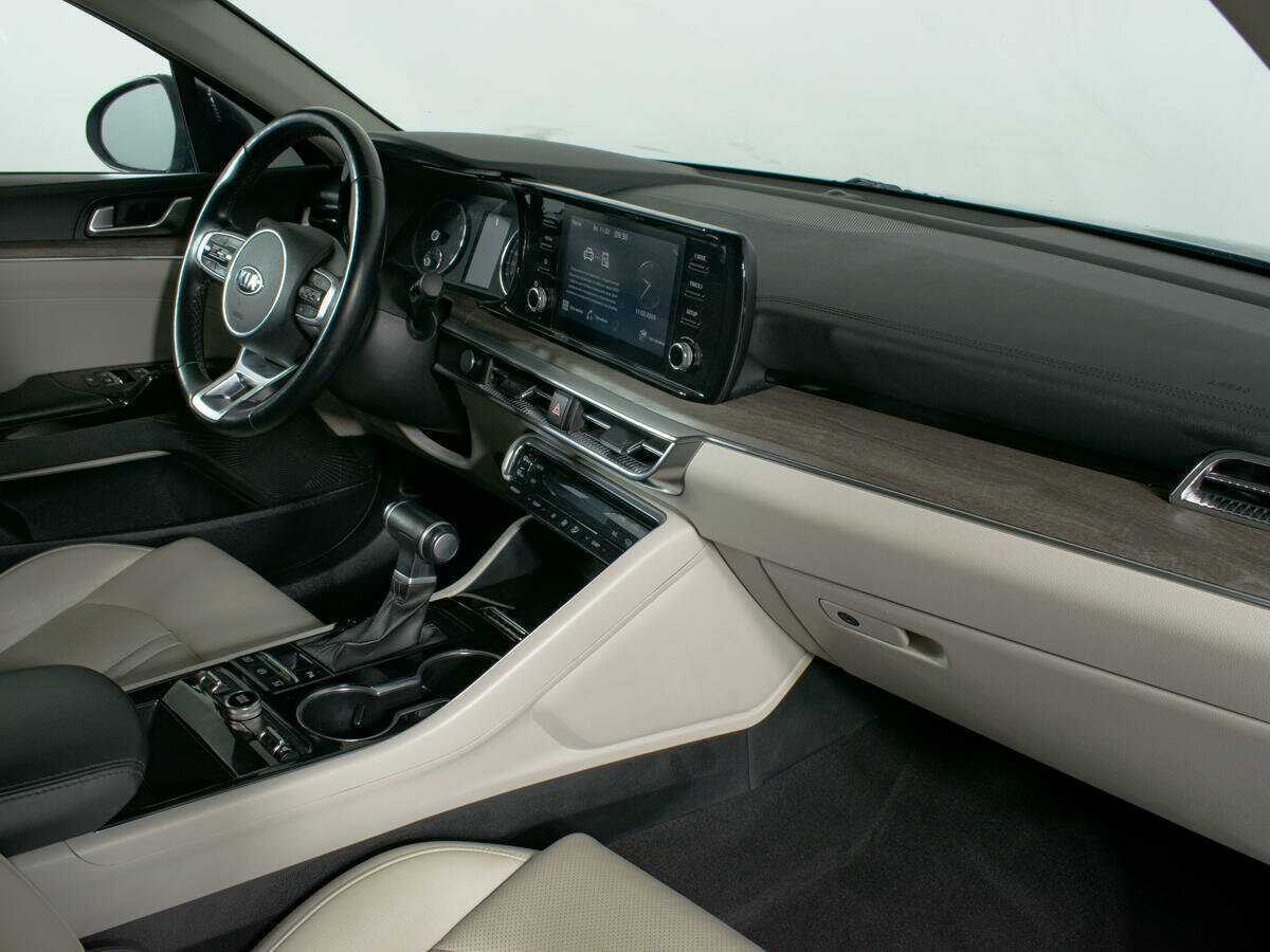 Купить Kia K5 с пробегом. Фото: #8