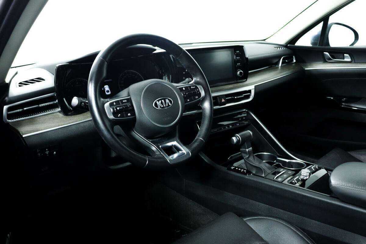 Купить Kia K5 с пробегом. Фото: #11