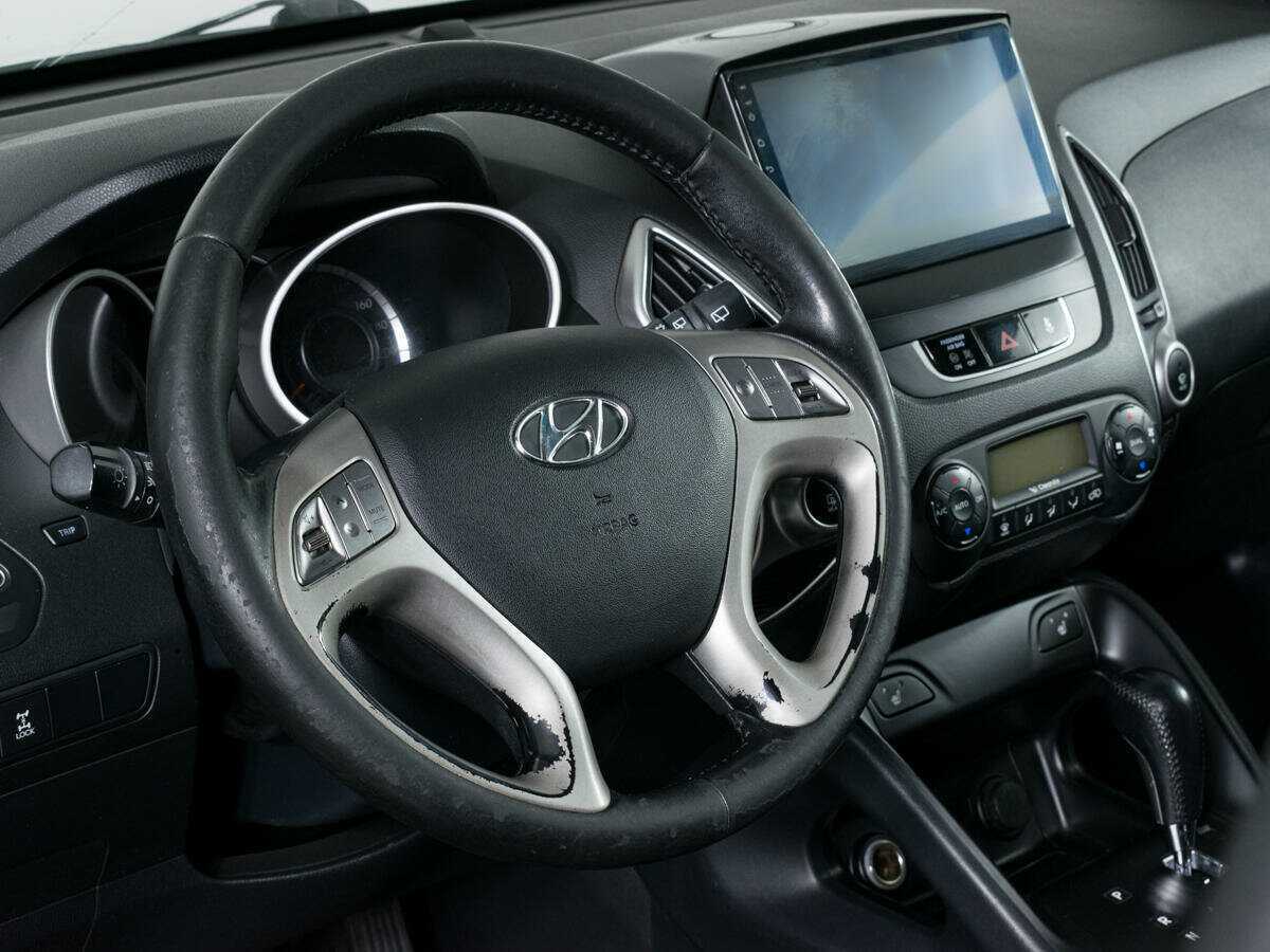 Купить Hyundai ix35 с пробегом. Фото: #10