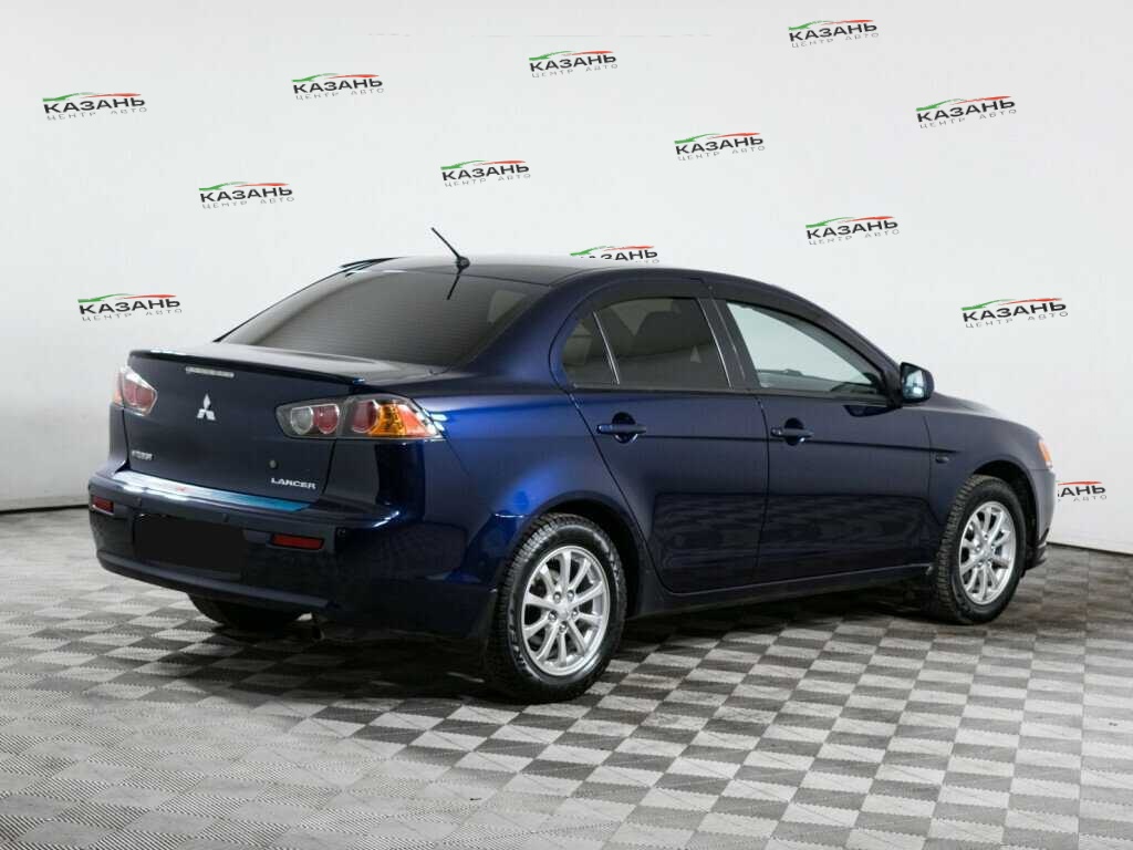 Купить Mitsubishi Lancer с пробегом. Фото: #2