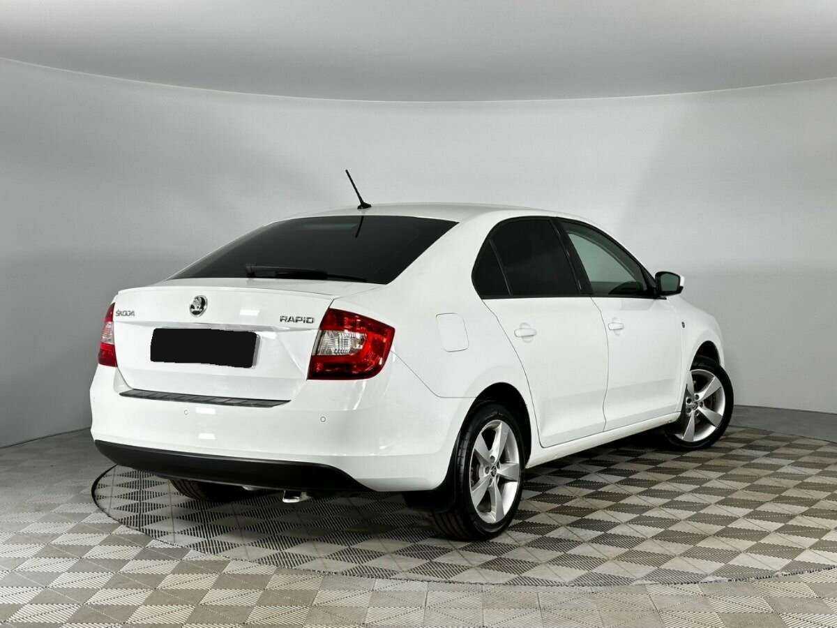 Купить Skoda Rapid с пробегом. Фото: #1