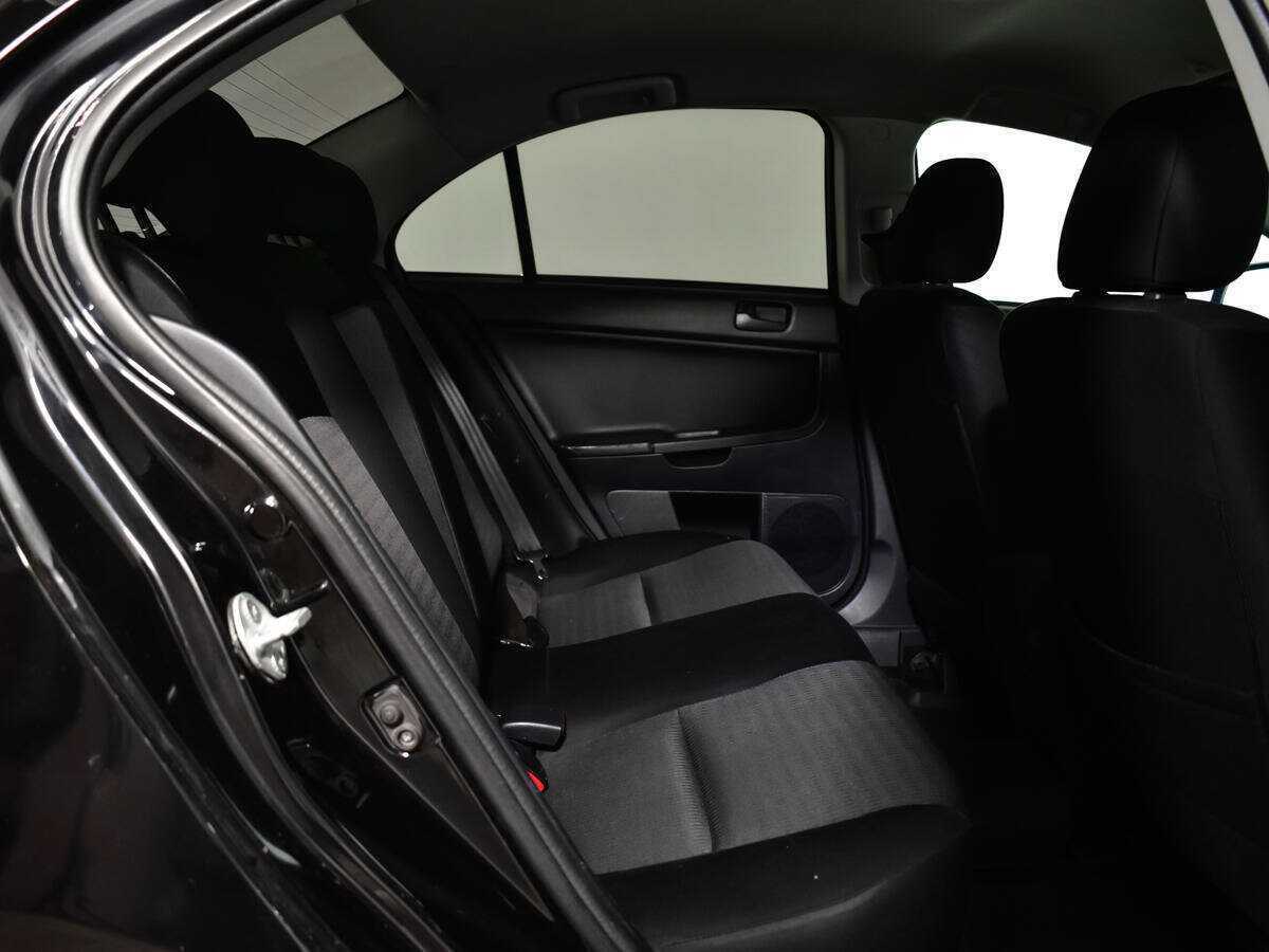 Купить Mitsubishi Lancer с пробегом. Фото: #9